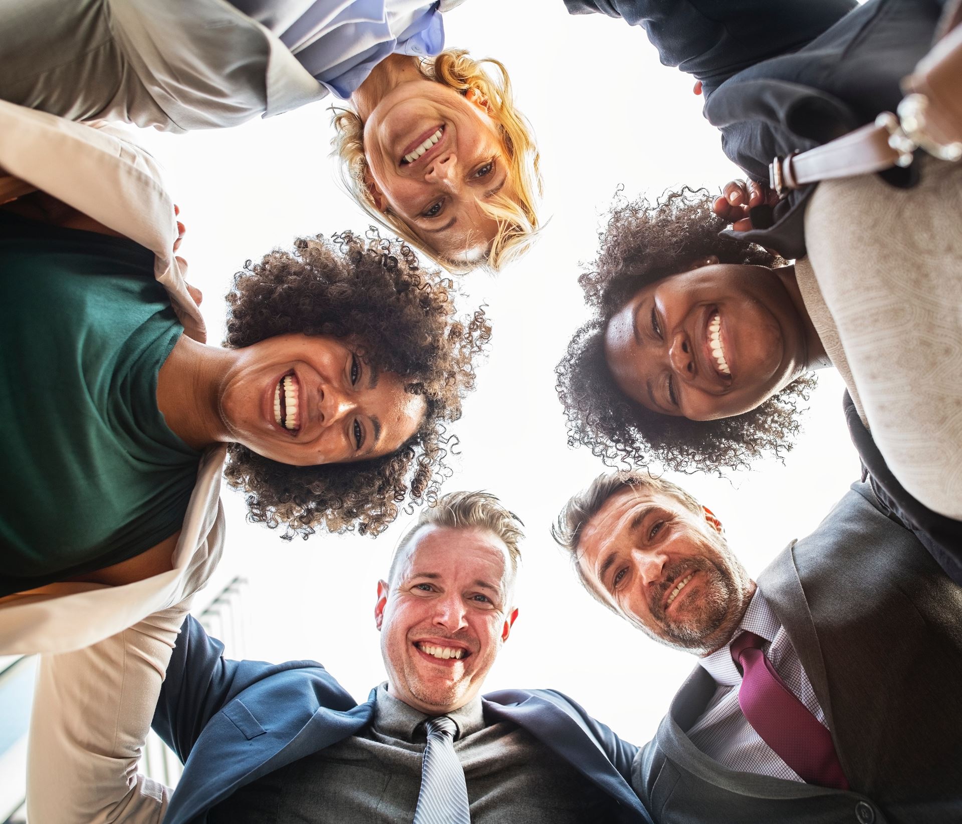 a group of people smiling for the camera